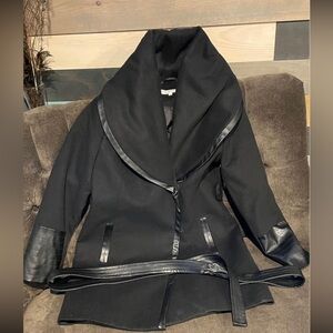 Cleo’s  black dressy jacket